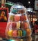 Banco di mostra dell'alimento del dessert della torre di Macaron di 4 file per i dolci del negozio del dolce che imballano scatola